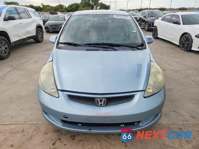 Piąte zdjęcie samochodu w środku: 2007 HONDA FIT VIN:JHMGD38457S014002 - miniatura