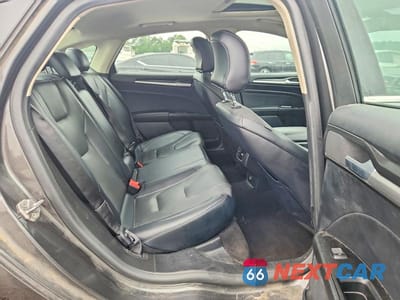 Zdjęcie 10 z 12 samochodu: 2019 FORD FUSION TITANIUM VIN:3FA6P0K91KR269439 - miniatura