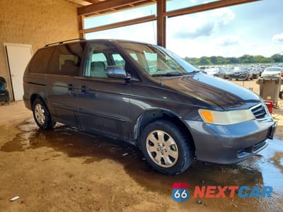 Czwarte zdjęcie samochodu z boku: 2004 HONDA ODYSSEY EX VIN:5FNRL18664B094275 - miniatura
