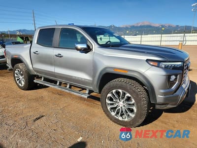 Czwarte zdjęcie samochodu z boku: 2023 GMC CANYON DENALI VIN:1GTP6FEK9P1135864 - miniatura
