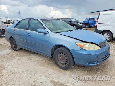 Czwarte zdjęcie samochodu z boku: 2002 TOYOTA CAMRY LE VIN:4T1BE32K72U511397 - miniatura