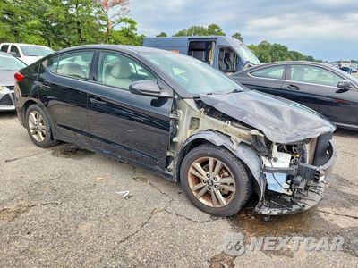 Czwarte zdjęcie samochodu z boku: 2018 HYUNDAI ELANTRA VALUE EDITION VIN:5NPD84LF9JH372796 - miniatura