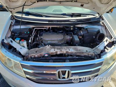 Zdjęcie 12 z 13 samochodu: 2012 HONDA ODYSSEY TOURING VIN:5FNRL5H99CB112722 - miniatura