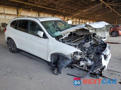 Czwarte zdjęcie samochodu z boku: 2018 BMW X1 SDRIVE28I VIN:WBXHU7C33J5L06848 - miniatura