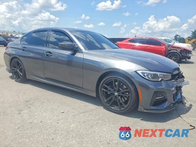 Czwarte zdjęcie samochodu z boku: 2021 BMW 330I VIN:3MW5R1J07M8B99783 - miniatura