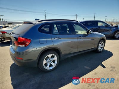 Trzecie zdjęcie samochodu z tyłu: 2014 BMW X1 SDRIVE28I VIN:WBAVM1C5XEVW50517 - miniatura