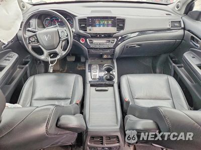 Zdjęcie 8 z 13 samochodu: 2020 HONDA PILOT TOURING VIN:5FNYF6H94LB008874 - miniatura