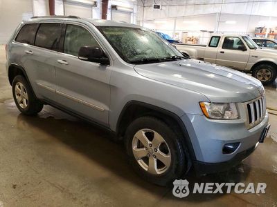 Czwarte zdjęcie samochodu z boku: 2012 JEEP GRAND CHEROKEE LIMITED VIN:1C4RJFBG5CC265906 - miniatura