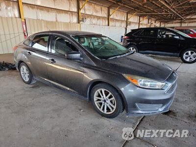 Czwarte zdjęcie samochodu z boku: 2018 FORD FOCUS SE VIN:1FADP3F27JL239994 - miniatura