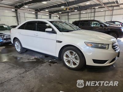 Czwarte zdjęcie samochodu z boku: 2014 FORD TAURUS SEL VIN:1FAHP2E91EG153203 - miniatura