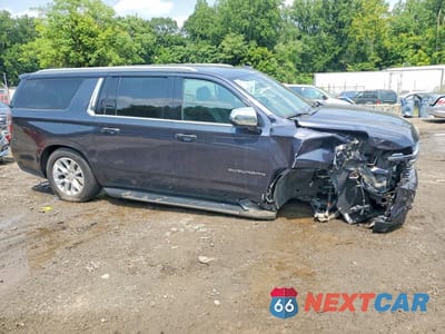 Czwarte zdjęcie samochodu z boku: 2023 CHEVROLET SUBURBAN C1500 PREMIER VIN:1GNSCFKD8PR552684 - miniatura