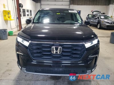 Piąte zdjęcie samochodu w środku: 2025 HONDA PILOT EXL VIN:5FNYG1H48SB043470 - miniatura
