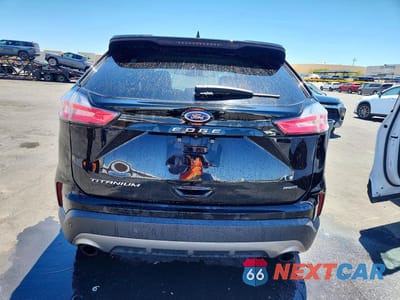 Zdjęcie 6 z 13 samochodu: 2022 FORD EDGE TITANIUM VIN:2FMPK4K98NBB04961 - miniatura