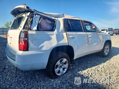 Trzecie zdjęcie samochodu z tyłu: 2019 CHEVROLET TAHOE K1500 VIN:1GNSKEKC3KR267243 - miniatura