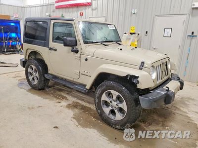 Czwarte zdjęcie samochodu z boku: 2017 JEEP WRANGLER SAHARA VIN:1C4AJWBG8HL730392 - miniatura