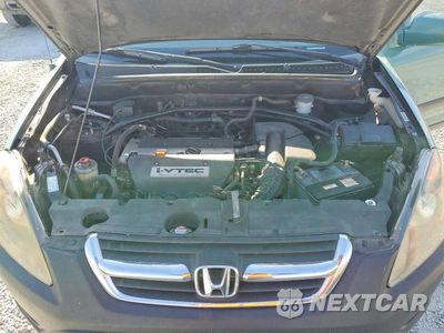 Zdjęcie 12 z 13 samochodu: 2004 HONDA CR-V LX VIN:JHLRD78484C032262 - miniatura