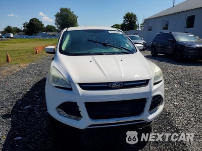 Piąte zdjęcie samochodu w środku: 2014 FORD ESCAPE SE VIN:1FMCU9GX3EUE05323 - miniatura