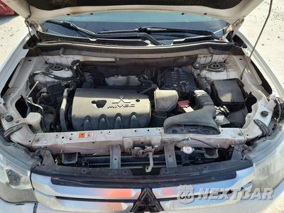 Zdjęcie 12 z 13 samochodu: 2015 MITSUBISHI OUTLANDER ES VIN:JA4AD2A31FZ008698 - miniatura