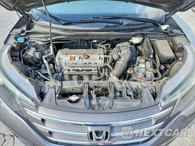 Zdjęcie 12 z 13 samochodu: 2014 HONDA CR-V EX VIN:5J6RM4H57EL010107 - miniatura