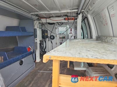 Zdjęcie 10 z 13 samochodu: 2011 FORD E350 VAN WITH BUCKET LIFT VIN:1FTSE3ES5BDB26100 - miniatura
