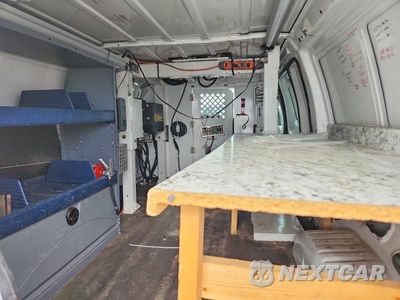 Zdjęcie 10 z 13 samochodu: 2011 FORD E350 VAN WITH BUCKET LIFT VIN:1FTSE3ES5BDB26100 - miniatura