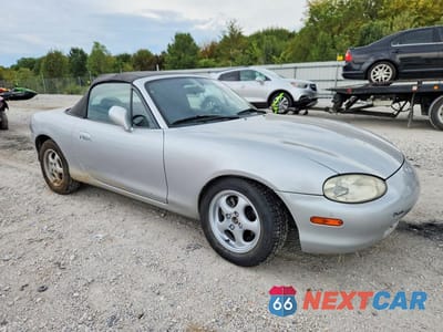 Czwarte zdjęcie samochodu z boku: 1999 MAZDA MX-5 MIATA VIN:JM1NB3539X0128994 - miniatura