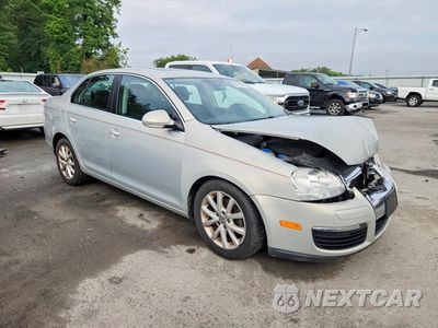 Czwarte zdjęcie samochodu z boku: 2010 VOLKSWAGEN JETTA SE VIN:3VWRZ7AJ9AM042255 - miniatura