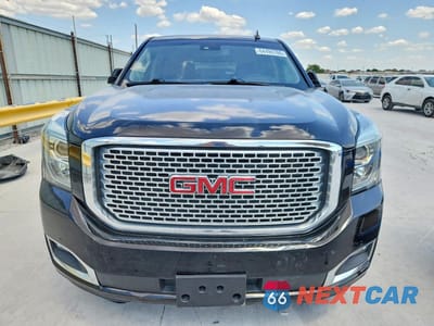 Piąte zdjęcie samochodu w środku: 2019 GMC YUKON DENALI VIN:1GKS1CKJ9KR320773 - miniatura