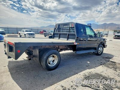 Trzecie zdjęcie samochodu z tyłu: 1999 FORD F350 SUPER DUTY VIN:1FTWX33F7XEC78060 - miniatura
