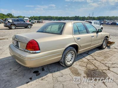 Trzecie zdjęcie samochodu z tyłu: 1999 FORD CROWN VICTORIA LX VIN:2FAFP74W9XX128087 - miniatura