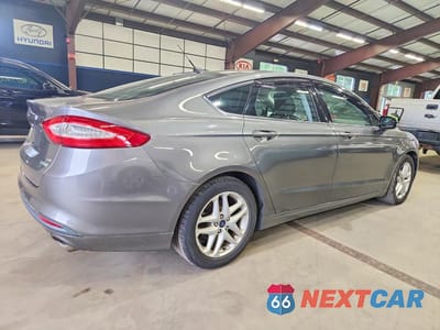 Trzecie zdjęcie samochodu z tyłu: 2014 FORD FUSION SE VIN:1FA6P0HD3E5358920 - miniatura
