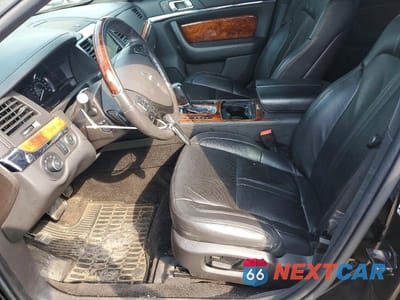 Zdjęcie 7 z 12 samochodu: 2016 LINCOLN MKS VIN:1LNHL9FT6GG600891 - miniatura