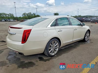 Trzecie zdjęcie samochodu z tyłu: 2013 CADILLAC XTS PREMIUM COLLECTION VIN:2G61S5S31D9212973 - miniatura