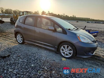 Czwarte zdjęcie samochodu z boku: 2011 HONDA FIT SPORT VIN:JHMGE8H54BC002140 - miniatura