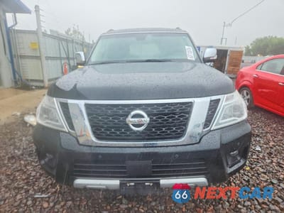 Piąte zdjęcie samochodu w środku: 2017 NISSAN ARMADA PLATINUM VIN:JN8AY2NE0H9704417 - miniatura