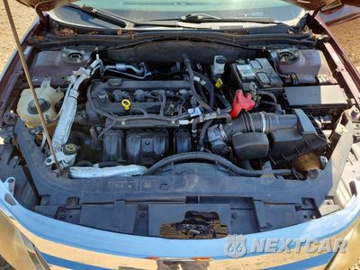 Zdjęcie 11 z 13 samochodu: 2012 FORD FUSION SEL VIN:3FAHP0JA0CR362975 - miniatura