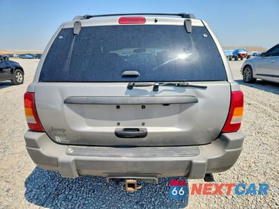 Zdjęcie 6 z 13 samochodu: 2002 JEEP GRAND CHEROKEE LAREDO VIN:1J4GW48N12C183036 - miniatura