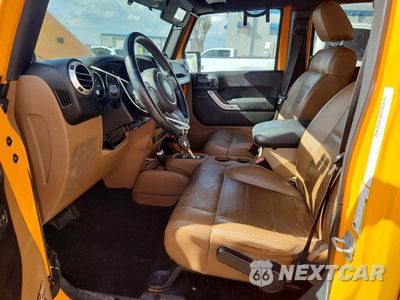 Zdjęcie 7 z 13 samochodu: 2012 JEEP WRANGLER UNLIMITED SAHARA VIN:1C4HJWEG0CL248017 - miniatura