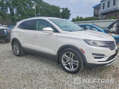 Czwarte zdjęcie samochodu z boku: 2015 LINCOLN MKC VIN:5LMTJ2AH6FUJ03671 - miniatura