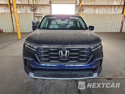 Piąte zdjęcie samochodu w środku: 2025 HONDA PILOT EXL VIN:5FNYG1H47SB022495 - miniatura