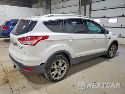 Trzecie zdjęcie samochodu z tyłu: 2014 FORD ESCAPE TITANIUM VIN:1FMCU9J93EUB43779 - miniatura
