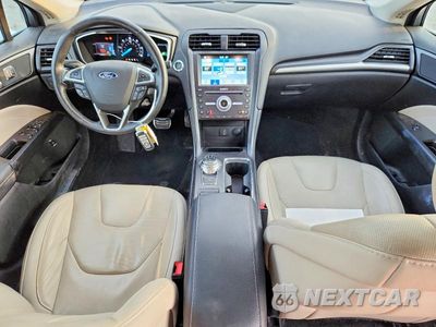 Zdjęcie 8 z 12 samochodu: 2017 FORD FUSION TITANIUM HEV VIN:3FA6P0RU1HR360553 - miniatura