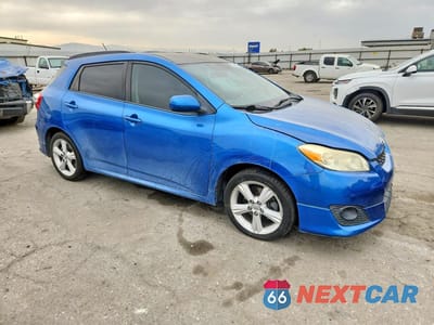 Czwarte zdjęcie samochodu z boku: 2009 TOYOTA MATRIX S VIN:2T1KE40E49C021627 - miniatura
