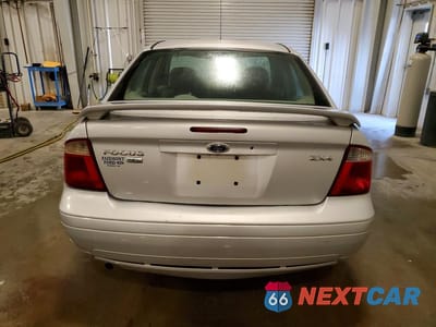 Zdjęcie 6 z 12 samochodu: 2005 FORD FOCUS ZX4 VIN:1FAFP34N45W295207 - miniatura