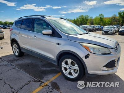 Czwarte zdjęcie samochodu z boku: 2014 FORD ESCAPE SE VIN:1FMCU0GX1EUB85935 - miniatura