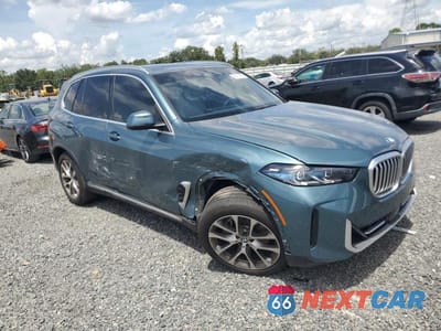 Czwarte zdjęcie samochodu z boku: 2025 BMW X5 XDRIVE40I VIN:5UX23EU0XS9Y20848 - miniatura