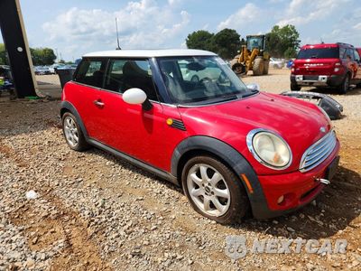 Czwarte zdjęcie samochodu z boku: 2010 MINI COOPER VIN:WMWMF3C51ATU78840 - miniatura