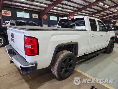 Trzecie zdjęcie samochodu z tyłu: 2017 GMC SIERRA K1500 VIN:1GTV2LEC0HZ217432 - miniatura