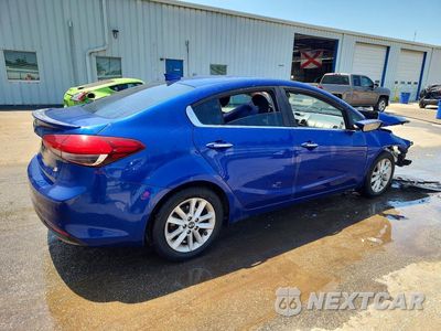 Trzecie zdjęcie samochodu z tyłu: 2017 KIA FORTE S VIN:3KPFL4A78HE128459 - miniatura