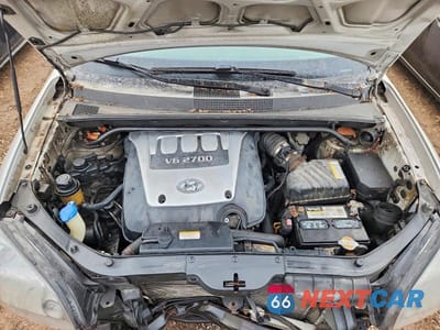 Zdjęcie 12 z 14 samochodu: 2006 HYUNDAI TUCSON GLS VIN:KM8JN12D76U264955 - miniatura